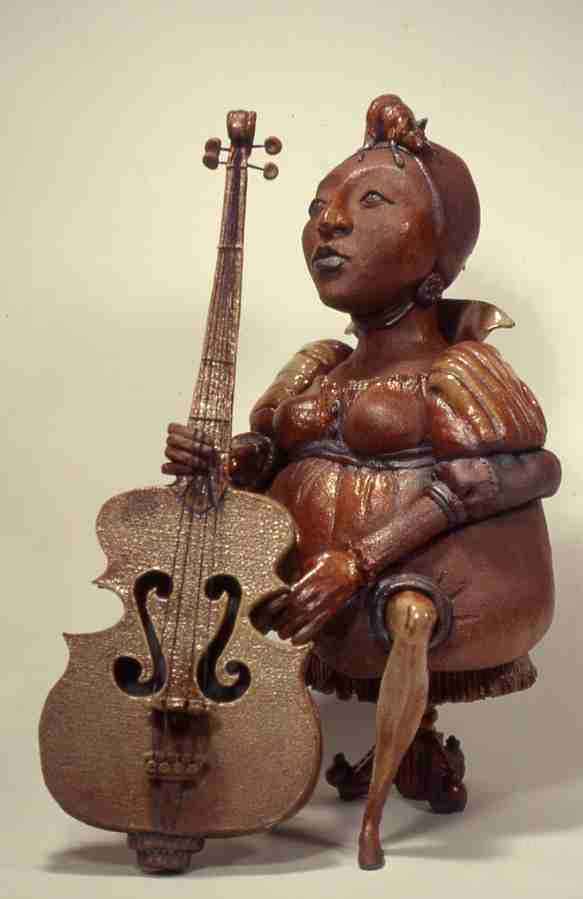 Cello Player With Rat On Her Head